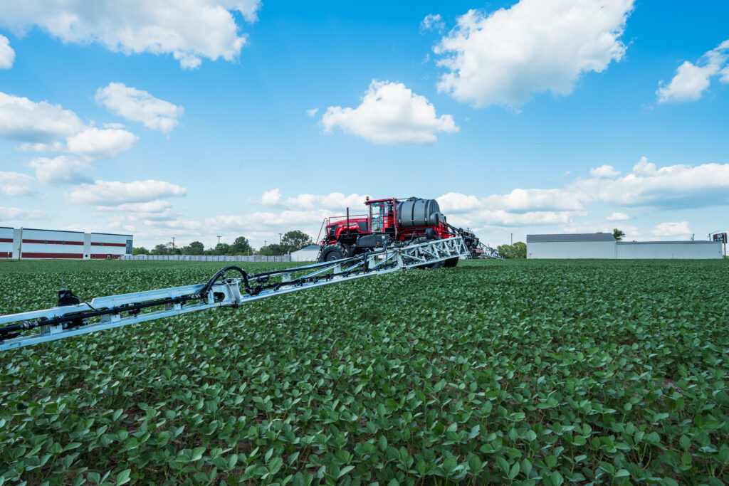 backside of apache sprayer in use