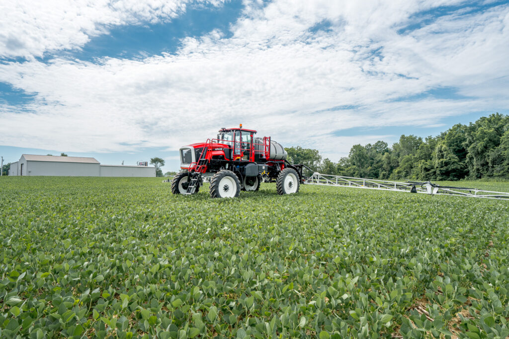 long shot of apace sprayer in use