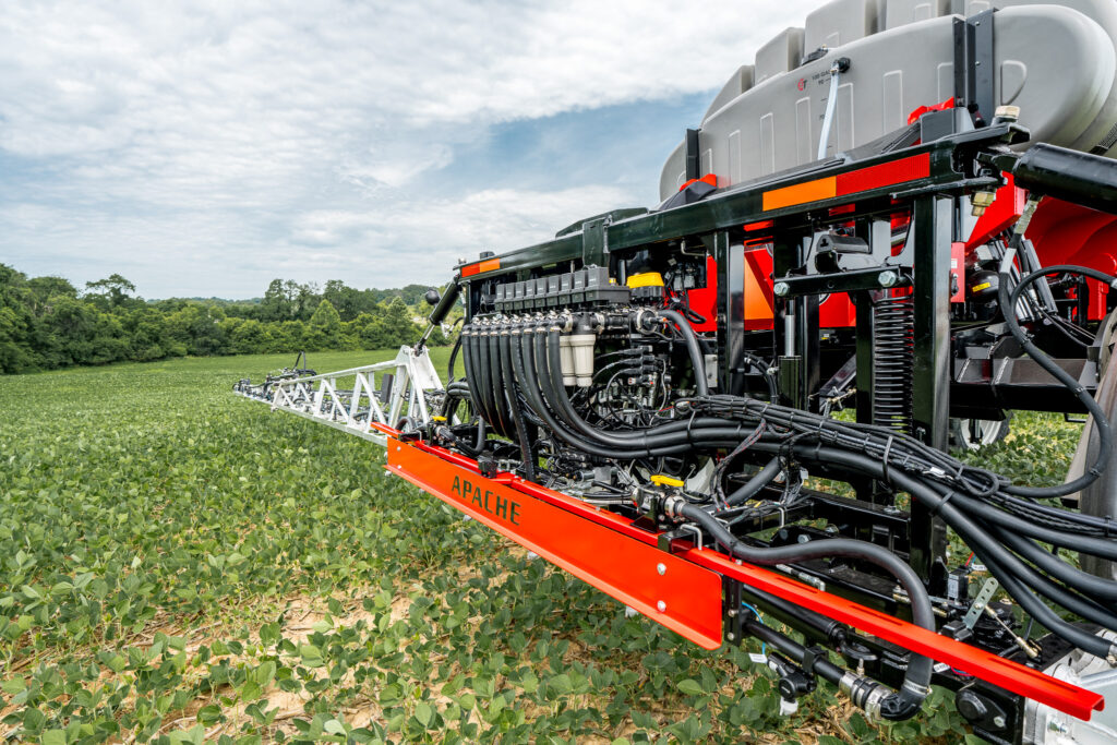 close up of backside of apache sprayer to see hoses